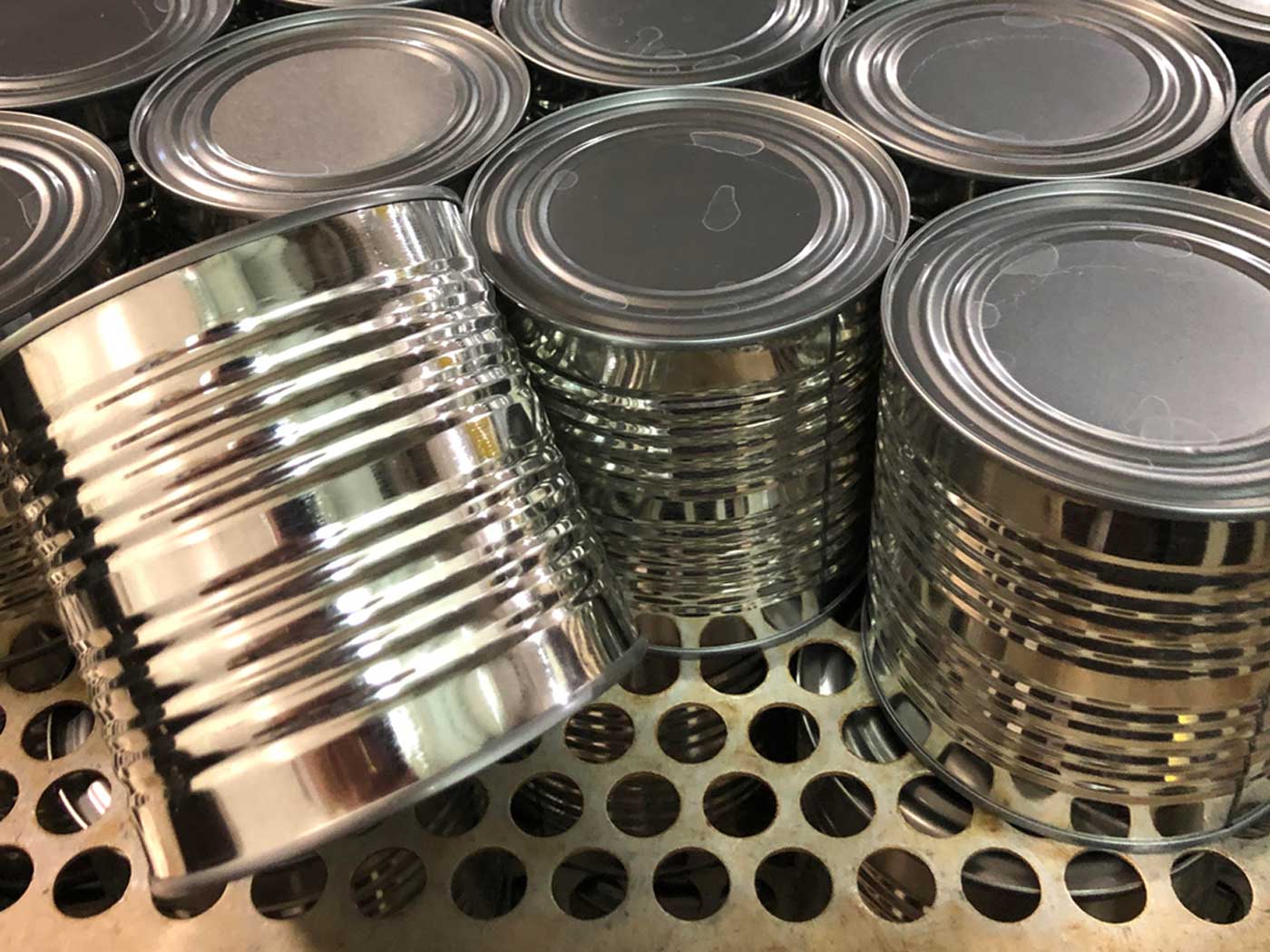 Cans treated with proper water treatment from Clarity Water Technologies