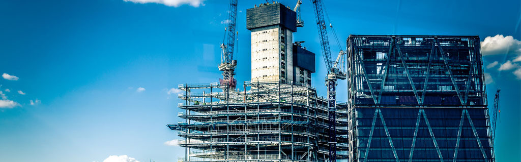 New construction of a tall building with cranes
